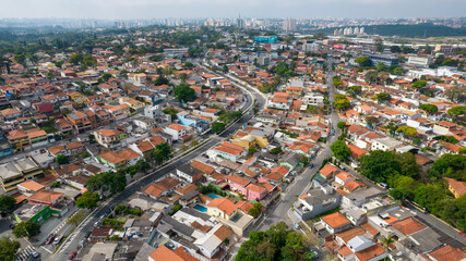 Fototapeta na wymiar Aerial view of the Interlagos district. Beautiful houses and a view of the Guarapiranga dam