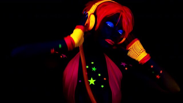 Female dancer in glow UV costume