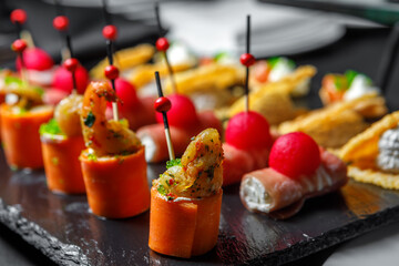 Canapes of shrimp, meat, cheese and other seafood.