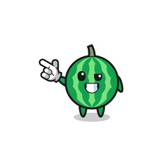 watermelon mascot pointing top left