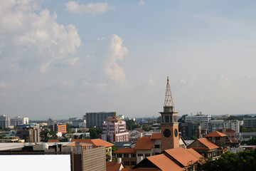 Naklejka premium Aerial view of a magnificent metropolis in Chiang Mai, Thailand, Asia, with a mountain perspective.