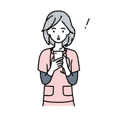 立ってスマートフォンを操作して何かに気づいて驚いた看護師の女性