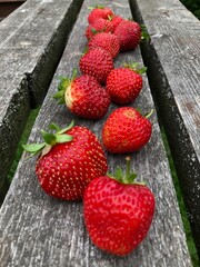 strawberries on wooden background