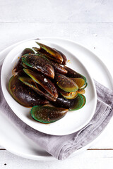 Kerang hijau saus asam manis. Green Mussels with sour sweet sauce.