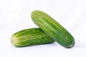 Two cucumbers for fresh vegetables, isolated on a white background