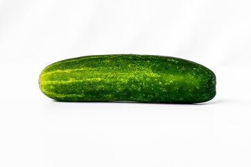 One cucumber for fresh vegetables, isolated on a white background