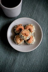 Asian cookies singapore or cashew Cookies with coffee on cozy background. This is a kind of Thai snack.