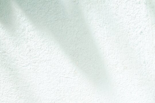 natural sunlight shadows on abstract white wall surface