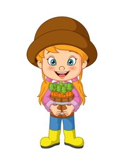 Cute little girl harvesting carrots