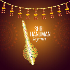 Hanuman jayanti celebration greeting card and background wiith lord hanuman weapon (Gad) © Simran Singh