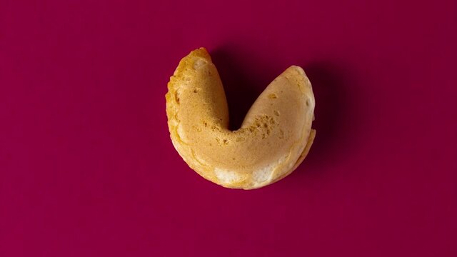 looped stopmotion of a fortune cookie imitating a beating heart. love concept