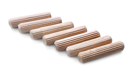 Many wooden dowel pins on white background