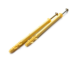 Screws and dowels on white background