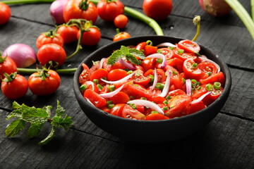 Vegan diet foods- organic cherry tomato salad.