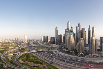 Naklejka na ściany i meble Aerial view of cityscape and skyline in Marina.Dubai UAE at sunset
