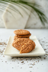 Plate with tasty hojicha cookies on table