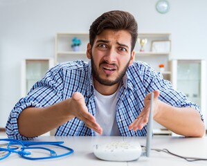 Frustrated young man due to weak internet reception