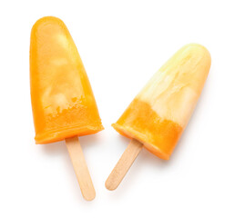 Tasty melon popsicles on white background