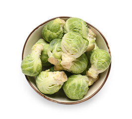Bowl with fresh Brussels sprouts on white background