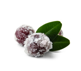 Tasty sugared cranberries on white background