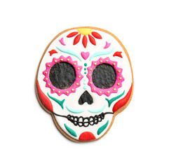 Skull shaped cookie for Mexico's Day of the Dead (El Dia de Muertos) on white background