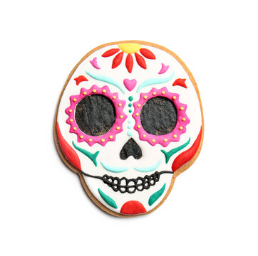 Skull shaped cookie for Mexico's Day of the Dead (El Dia de Muertos) on white background