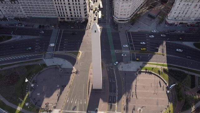 Aerial orbit shot of famous Obelisco De Buenos Aires surrounded by busy roads. Buenos Aires,Argentina. 4K Shot