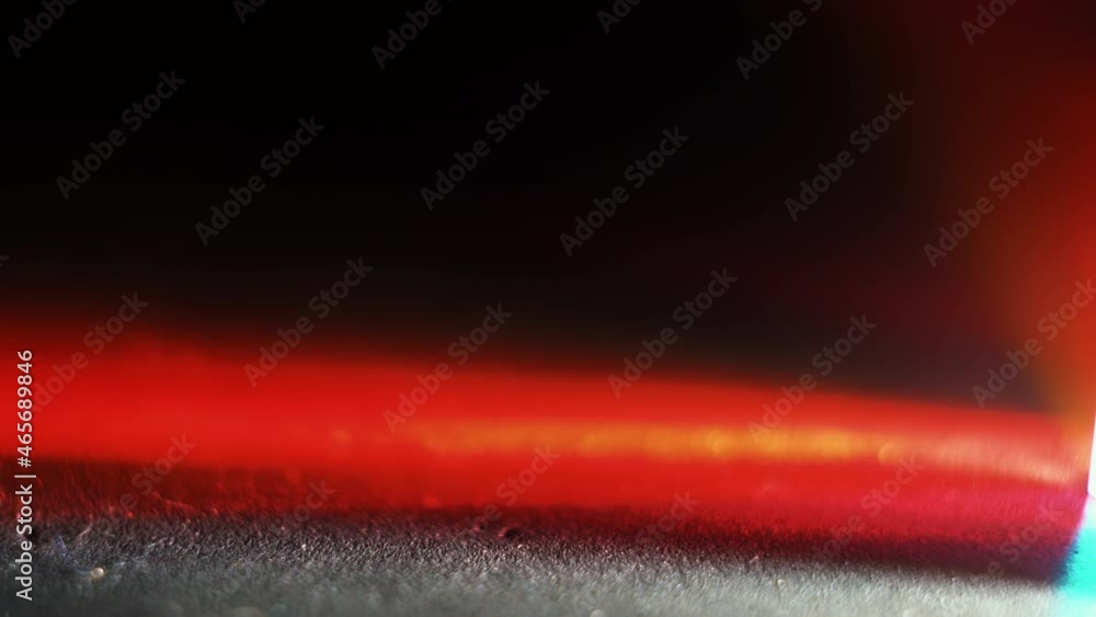 Poster colorful abstract background texture with flashing lights from the light ray reflections of a crysta