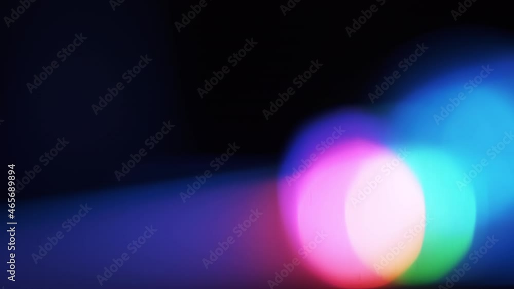 Poster colorful abstract background texture with bokeh blurred out flashing lights from the light ray refle