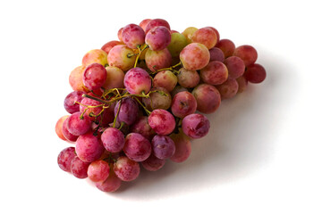 a brush of table pink grapes on a white background