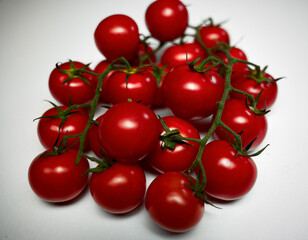 Cherry tomato composition on white background