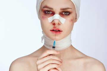 emotional woman plastic surgery operation bare shoulders light background