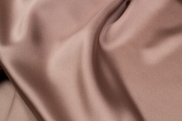Fototapeta premium Texture of the fabric swirling in a whirlpool. cloth background. Web article template. Long header banner format. Sale coupon. Visit card. Your information. Text space.