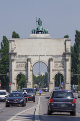 Beautiful historic antique buildings in Munich Muenchen Old Town Downtown Marienplatz area with churches, cathedrals and ancient facades in romantic side streets backstreet alleys