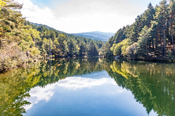 waterfall in the Presa del Pradillo in the Sierra de Guadarrama, Madrid
