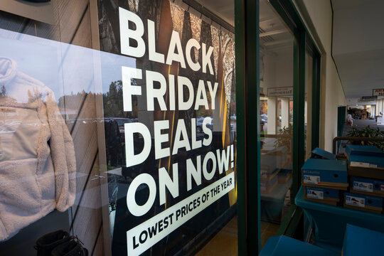 Lake Oswego, OR, USA - Oct 27, 2021: Black Friday deals advertising is seen at the storefront of the Columbia Sportswear Factory Store in Lake Oswego, Oregon, during the 2021 holiday shopping season.