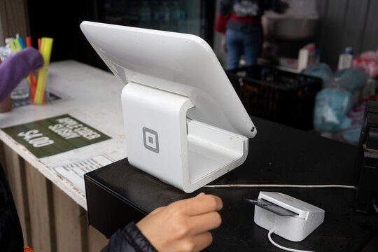 Gervais, OR, USA - Oct 9, 2021: A Square POS Stand With A Chip Card Reader Is Seen Processing Payments At A Food Stand In Bauman's Farm In Gervais, Oregon.