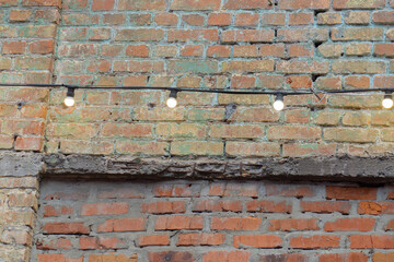 Fototapeta premium lighting an old building with lamps