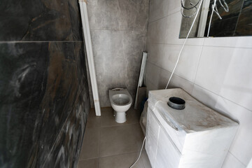 bathroom renovation - removing tiles in apartment bathroom