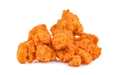 Fried spicy popcorn chicken isolated on white background.