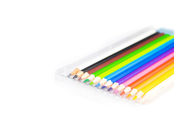 An image isolated select focus colour crayons art for draw drawing design on white background with...