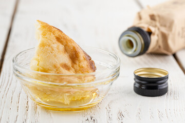 Close up olive oil bottle on table