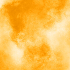 Yellow abstract background with spots of bright paint and small splashes, colored background