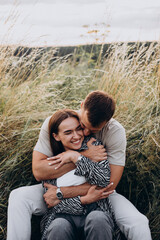 Young couple together in meadow