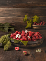 Still life with raspberries. Rustic style. Fresh raspberries.