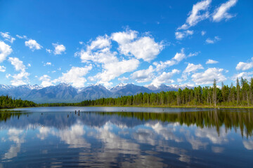 Fototapeta na wymiar Landscape with mountains reflecting in the water on summer day. Buryatia, Tunkinskaya valley