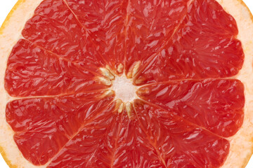 Halved red grapefruit close up on white background