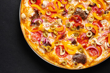 tasty pizza on the black background
