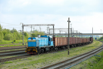 Fototapeta na wymiar vintage train on the rails of the railway