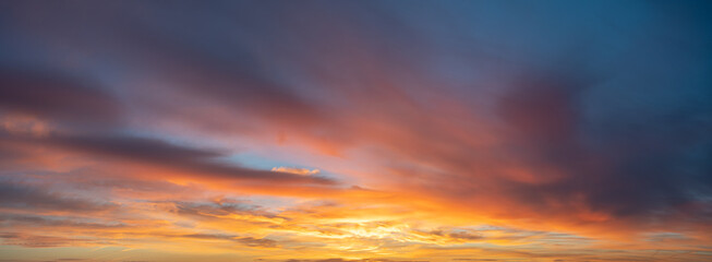 Fiery sunset, colorful clouds in the sky